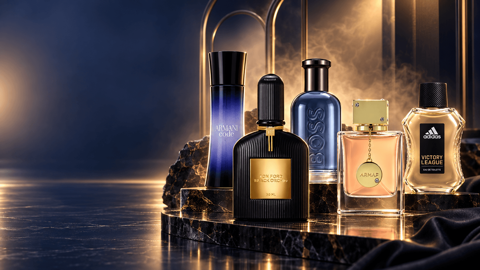 Luxury fragrance bottles arranged on a midnight and champagne studio set
